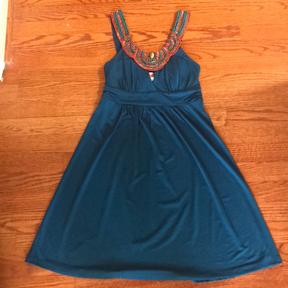 Dress with beaded neck detail